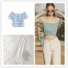 Trendy high-waist Korean-style jeans with a relaxed fit, perfect for casual outings or streetwear looks. 