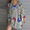 A comfortable, stylish Mattswag Ladies’ Butterfly Print Mini Dress, featuring a loose fit, V-neckline, and long sleeves, perfect for casual summer outings. 