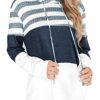 Casual women’s lightweight hoodie with a color block and striped print, featuring long sleeves and an attached hood for cozy cool-weather wear. 